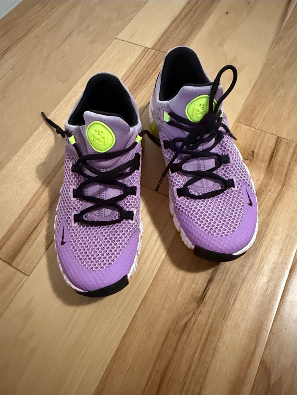 Nike Lavender Running Shoes with Neon Yellow Accents